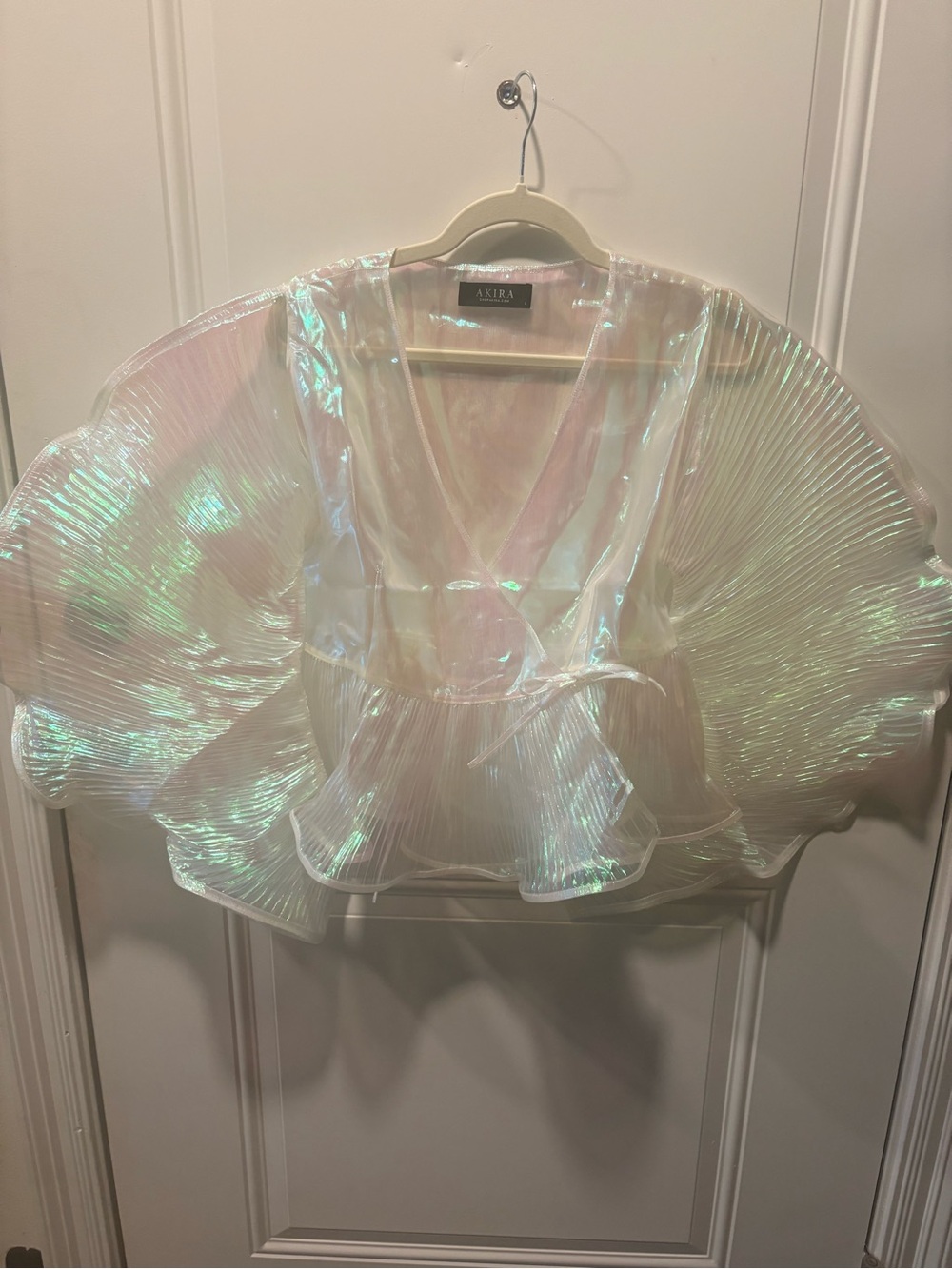 AKIRA Iridescent Sheer Pleated Peplum Top in Pearl